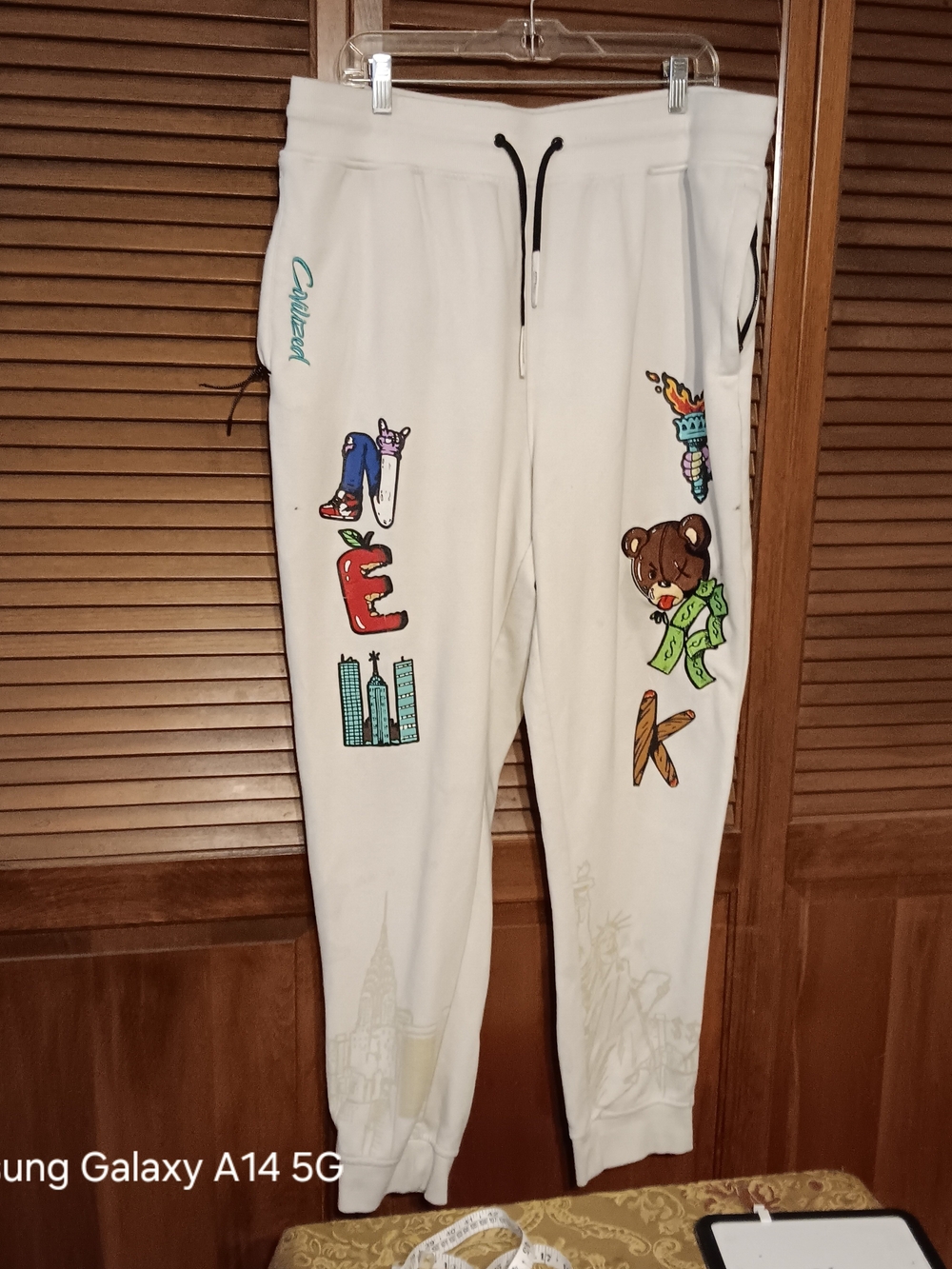 White Graphic Men's Joggers with Colorful Street Art Prints